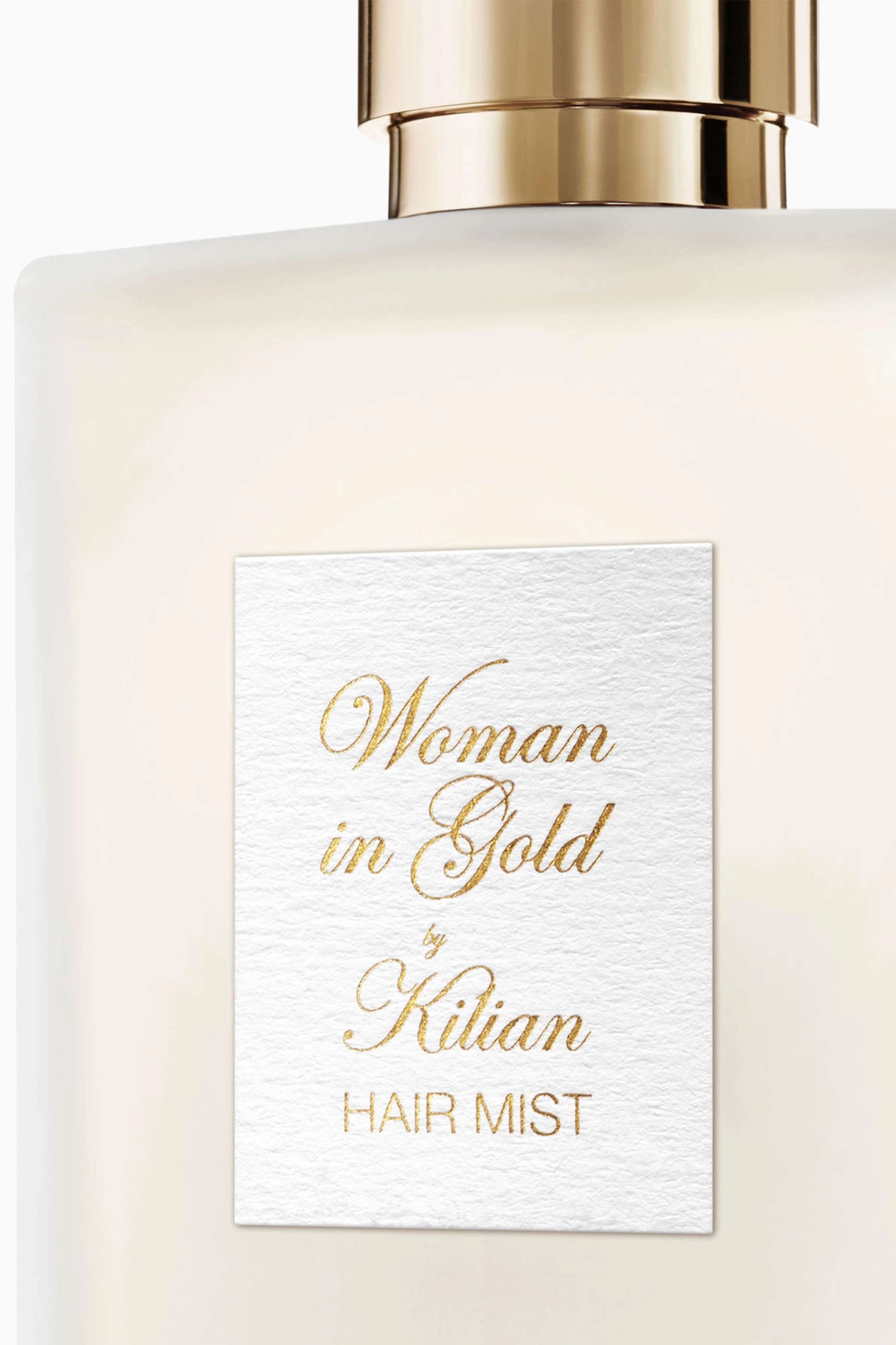 Woman in Gold Hair Mist - 50 milliliter captivating fragrance with notes of bergamot, rose absolute, and vanilla