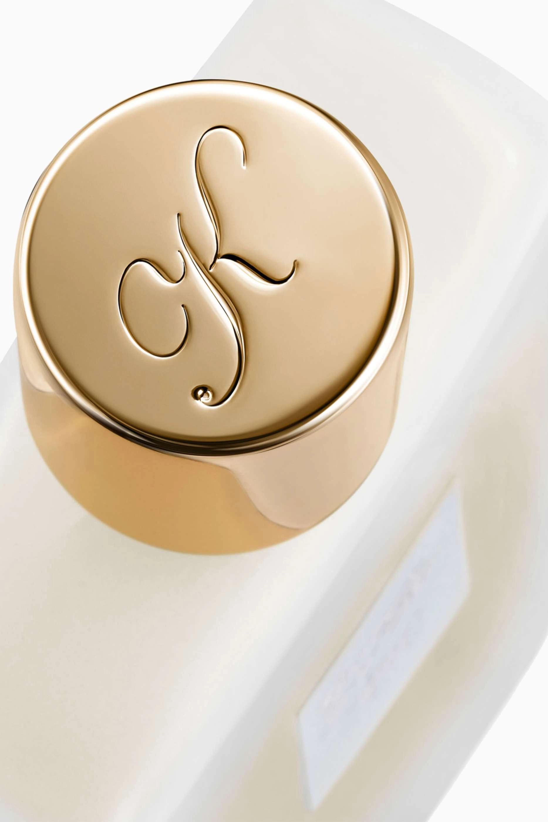 Woman in Gold Hair Mist - 50 milliliter captivating fragrance with notes of bergamot, rose absolute, and vanilla