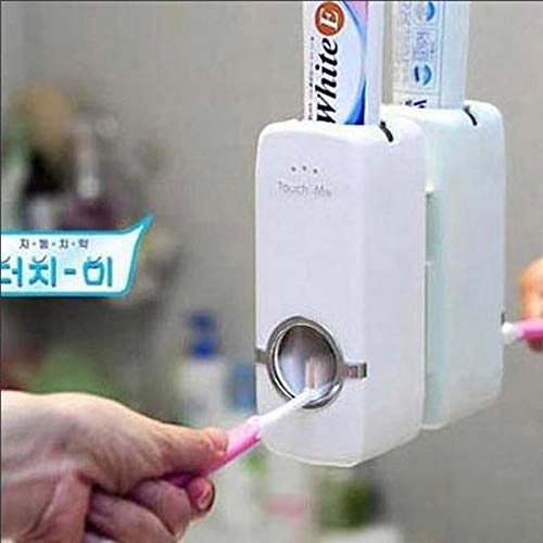 Toothbrush holder and toothpaste dispenser