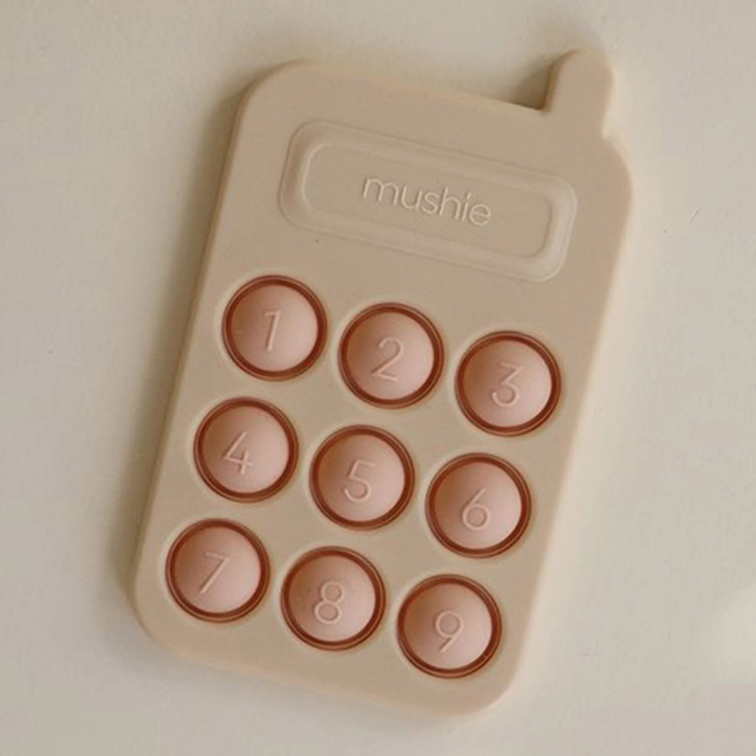 Mushie Phone Press Toy - 6 months+