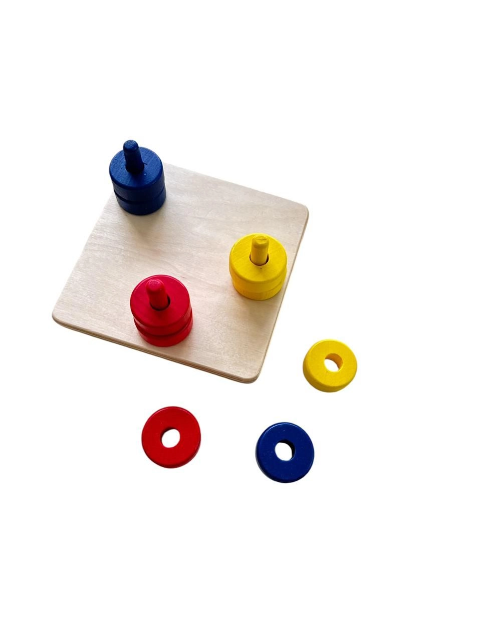 Coloured Discs On Coloured Dowels - Suitable for 12 months and above 10 pieces