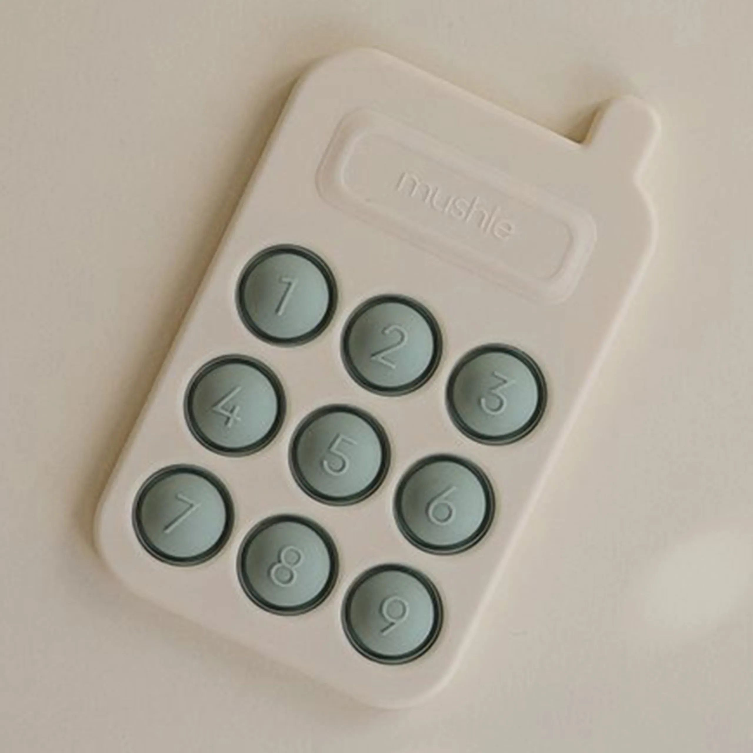 Mushie Phone Press Toy - 6 months+