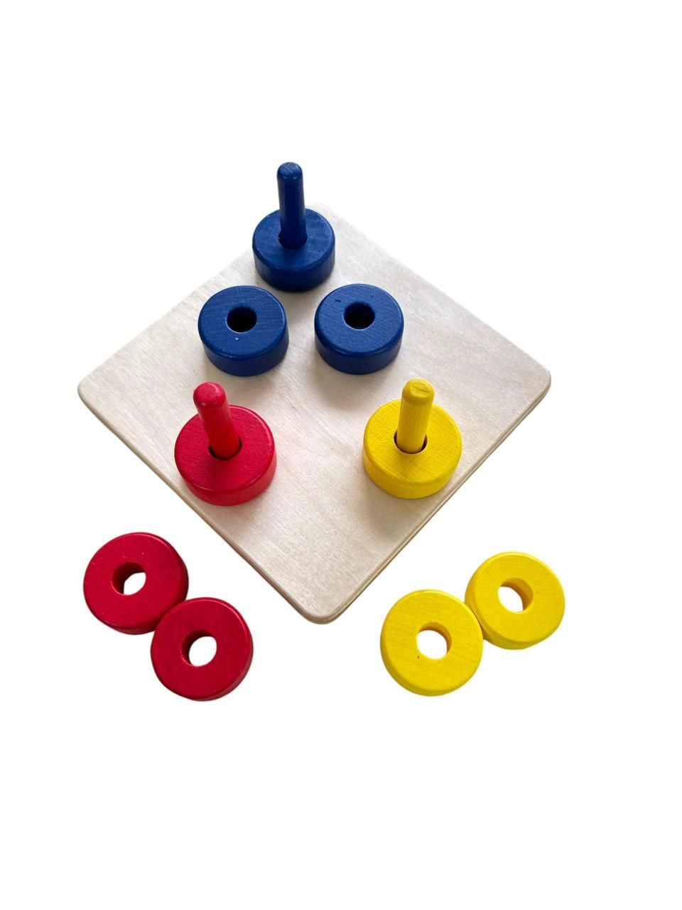 Coloured Discs On Coloured Dowels - Suitable for 12 months and above 10 pieces