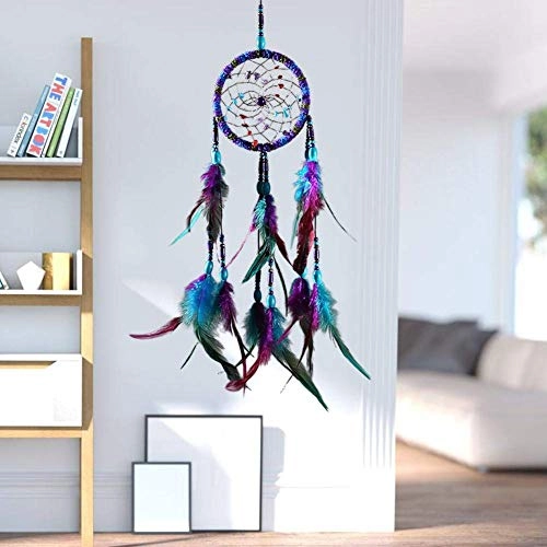 Dreamcatcher - Siderosphere, feathers, lines, wood beads.