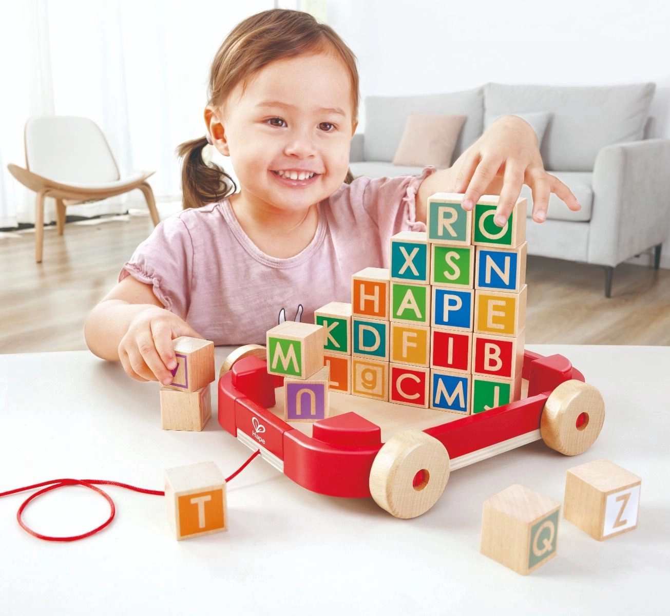 Pull Along Cart With Stacking Blocks - one pull-along trailer and 26 blocks
