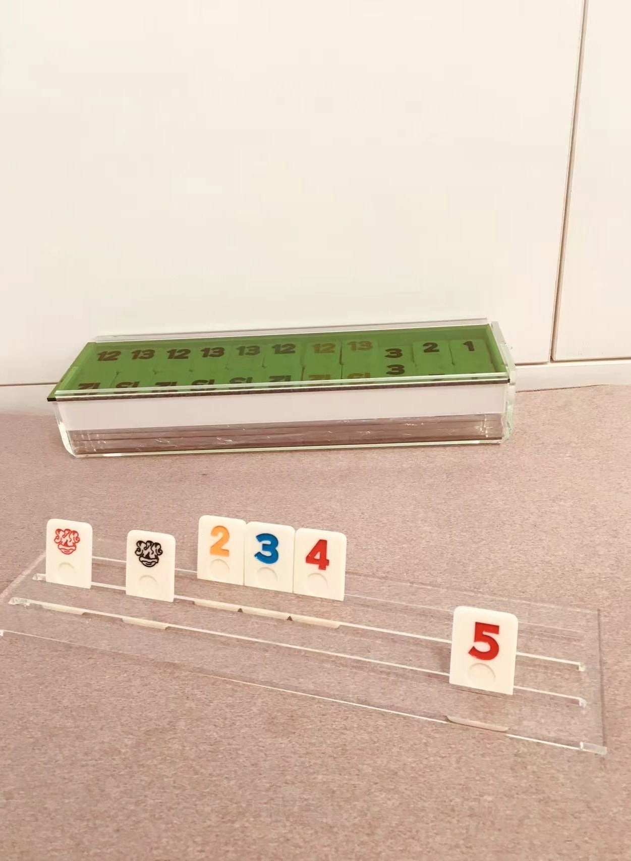 Rummikub - 106 tiles 4 racks Acrylic Case (Green lid)