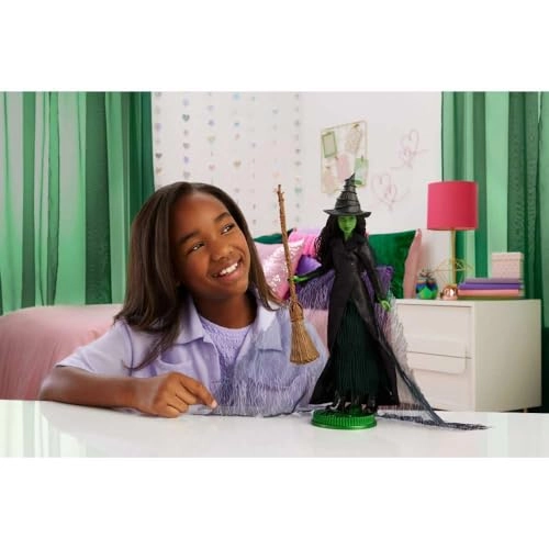 Elphaba Fashion Doll - Green skin Black braided hair Sheer black dress